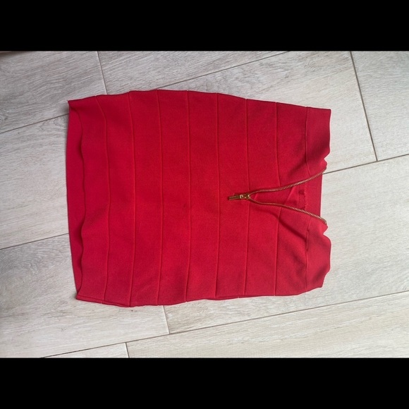 Holiday Ready with this Red knit stretch mini skirt. - Picture 4 of 5